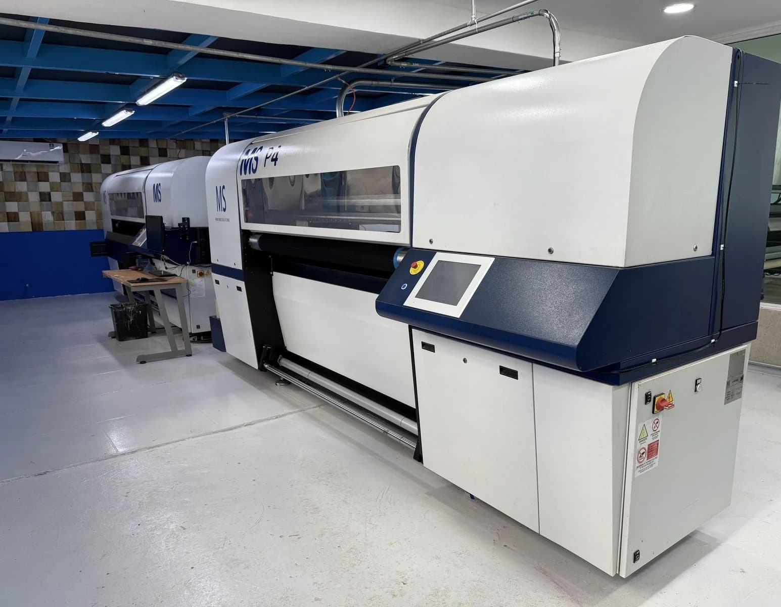 Industrial sublimation printers in the Re:Cycla plant in Mexico, where our team jerseys are printed