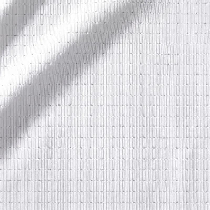 Pádel Pro recycled polyester fabric, micro-perforated stretch knit, close-up